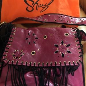 Great Looking Sharif Leather Bag with Fringes.